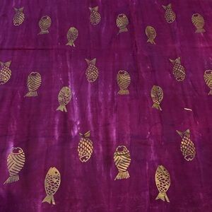1.625 yards of 100% cotton Batik purple with metallic gold fish